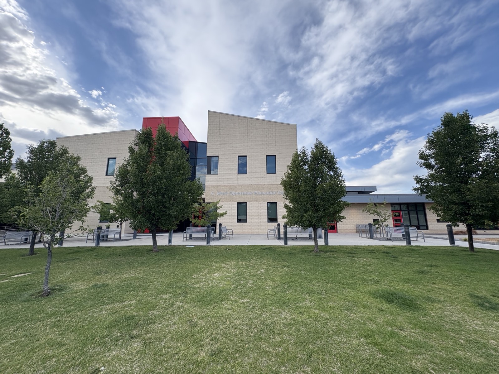 The C. Mark Openshaw Education Center at the Salt Lake campus, a modern two-story building with red accents